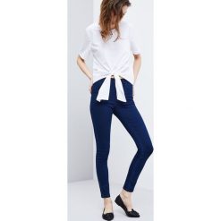 Jegginsy typu high waist. Jeansy damskie MOODO, bez wzorów, z denimu, z podwyższonym stanem. Za 19.99 zł.