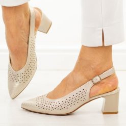 Złote ażurowe czółenka damskie bez pięty Sergio Leone Sk463. Żółte czółenka damskie Sergio Leone, na lato, w ażurowe wzory, ze skóry, biznesowe, bez obcasa, na obcasie, bez zapięcia. Za 179.00 zł.