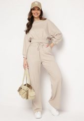Beżowy Komplet Bawełniany Spodnie Szerokie ze Sznurkiem w Pasie i Bluza ze Ściągaczami Urionne. Brązowe bluzy damskie Born2be, l, bez wzorów, z bawełny, eleganckie, bez ramiączek, bez kaptura. Za 209.99 zł.