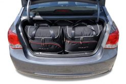 Torby Do Bagażnika Chevrolet Cruze Limousine 2008-2014 5Szt Kjust. Czarne torby podróżne damskie KJUST, bez wzorów, z kauczuku. Za 1,502.00 zł.