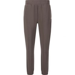 Damskie spodnie dresowe Athlecia Jillnana V2. Czarne spodnie dresowe damskie Athlecia, bez wzorów, z dresówki, sportowe, na fitness i siłownię. Za 239.50 zł.