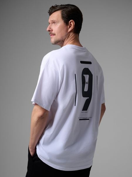 4F T-shirt loose z nadrukiem męski 4F x Robert Lewandowski - biały S. Białe koszulki sportowe męskie 4F, l, bez wzorów, z bawełny, bez ramiączek. Za 99.99 zł.