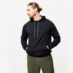 Bluza z kapturem męska Domyos fitness. Czarne bluzy męskie DOMYOS, m, bez wzorów, z elastanu, z kapturem, na fitness i siłownię. W wyprzedaży za 59.99 zł.