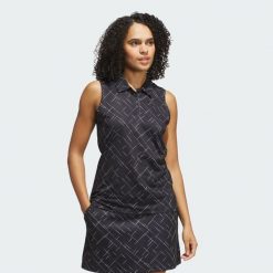 Koszulka Ultimate365 Printed Sleeveless Polo. Czarne bluzki damskie Adidas, bez wzorów, sportowe, bez kołnierzyka, bez ramiączek. W wyprzedaży za 223.20 zł.