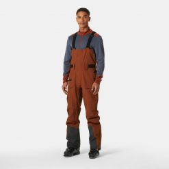 Spodnie narciarskie z szelkami Helly Hansen Sogn Shell. Brązowe spodnie sportowe męskie Helly Hansen, m, bez wzorów, narciarskie. Za 1,459.50 zł.