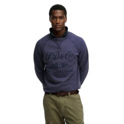 Bluza Superdry Merchant Vintage Print. Niebieskie bluzy męskie Superdry, m, bez wzorów, vintage, bez ramiączek, bez kaptura. Za 327.70 zł.