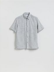 Strukturalna koszula regular fit - granatowy. Niebieskie koszule męskie Reserved, l, bez wzorów, z bawełny, bez kołnierzyka, bez ramiączek. Za 119.99 zł.