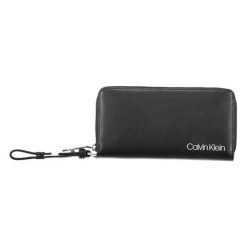 Portfel w kolorze czarnym. Czarne portfele damskie Calvin Klein, z materiału. W wyprzedaży za 299.95 zł.