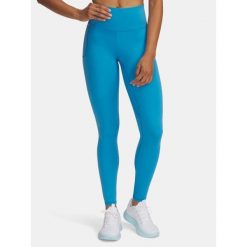 Legginsy treningowe damskie Under Armour Motion. Niebieskie legginsy damskie Under Armour, bez wzorów. Za 149.99 zł.