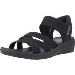 Sandały SKECHERS SLIP-INS ARYA Czarny. Czarne sandały damskie Skechers, bez wzorów, z materiału, bez obcasa, bez zapięcia. Za 278.99 zł.