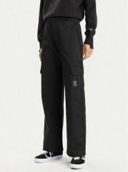 Champion Spodnie dresowe 117201 Czarny Relaxed Fit. Czarne spodnie dresowe damskie Champion, bez wzorów, z bawełny. Za 179.99 zł.