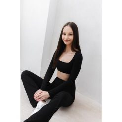 Top do jogi Moonholi Flash z długimi rękawami. Czarne topy damskie MOONHOLI, bez wzorów, sportowe, bez kołnierzyka, bez ramiączek. Za 259.00 zł.