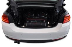 Torby Do Bagażnika Bmw 4 Cabrio 2013-2020 3Szt Kjust. Czarne torby podróżne damskie KJUST, bez wzorów, z kauczuku. Za 701.00 zł.