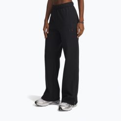 Spodnie treningowe damskie Under Armour Icon Vida Fleece. Czarne spodnie dresowe damskie Under Armour, bez wzorów, sportowe. Za 189.99 zł.