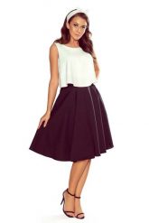 Czarna Casualowa Rozkloszowana Midi Spódnica z Kieszeniami. Czarne spódnice damskie Numoco, xl, bez wzorów, z elastanu, midi, rozkloszowane. Za 138.90 zł.