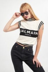 Top wełniany damski BALMAIN. Topy damskie Balmain, bez wzorów, z wełny, bez kołnierzyka, bez ramiączek. W wyprzedaży za 3,381.75 zł.
