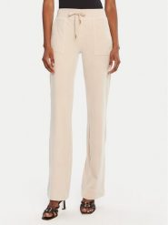 Juicy Couture Spodnie dresowe Del Ray JCAP180G Beżowy Regular Fit. Brązowe spodnie dresowe damskie Juicy Couture, bez wzorów, z dresówki. Za 309.99 zł.