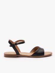 Czarne płaskie sandały. Czarne sandały damskie Ryłko, bez wzorów, z syntetyku, z okrągłym noskiem, bez obcasa, na płaskiej podeszwie, bez zapięcia. Za 299.99 zł.