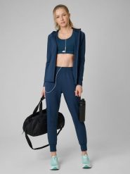 4F Spodnie treningowe szybkoschnące damskie - turkusowe XS. Niebieskie spodnie dresowe damskie 4F, bez wzorów, z elastanu, sportowe, na fitness i siłownię. Za 179.99 zł.