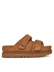 Ugg Klapki W Goldenstar Hi Slide 1155458 Brązowy. Brązowe klapki damskie UGG, bez wzorów, ze skóry, bez obcasa, bez zapięcia. Za 559.99 zł.