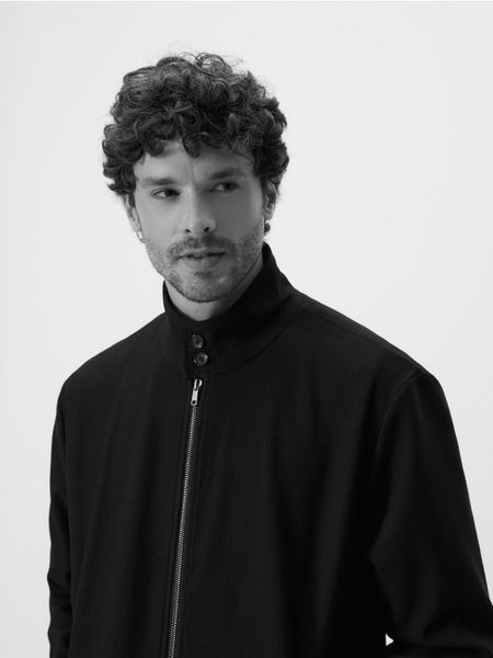 Kurtka ze stójką - granatowy. Niebieskie kurtki męskie Reserved, l, bez wzorów, z tkaniny, bez kaptura. Za 199.99 zł.