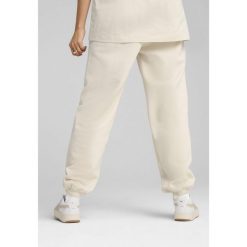 Spodnie dresowe unisex Essentials Elevated PUMA Alpine Snow White. Białe spodnie dresowe damskie Puma, s, bez wzorów, z dresówki, trekkingowe. W wyprzedaży za 179.00 zł.