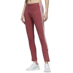 Spodnie legginsy damskie adidas W New A 78 TIG. Czerwone legginsy damskie Adidas, bez wzorów. Za 120.99 zł.
