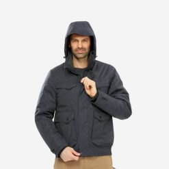 Kurtka turystyczna męska zimowa Quechua NH500 -10°C wodoodporna. Czarne kurtki męskie QUECHUA, na zimę, m, bez wzorów, sportowe, bez kaptura. Za 349.99 zł.