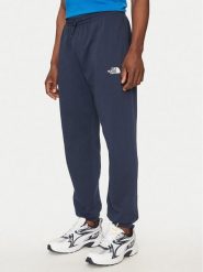 The North Face Spodnie dresowe Simple Dome Light NF0A8C41 Granatowy Regular Fit. Niebieskie spodnie sportowe męskie The North Face, m, bez wzorów, z bawełny. Za 329.99 zł.