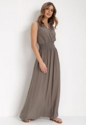 Ciemnozielona Sukienka Clymiolea. Zielone sukienki damskie Born2be, m, bez wzorów, z tkaniny, eleganckie, bez kołnierzyka, bez ramiączek, maxi, kopertowe. Za 59.99 zł.