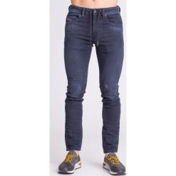 JEANSY THOMMER CB-NE CARROT FIT DIESEL. Niebieskie jeansy męskie Diesel, z jeansu. Za 514.50 zł.