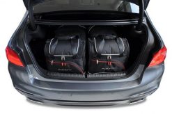 Torby Do Bagażnika Bmw 5 Limousine 2016-2023 4Szt Kjust. Czarne torby podróżne damskie KJUST, bez wzorów, z kauczuku. Za 1,249.00 zł.