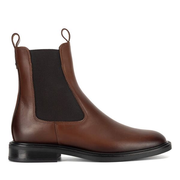 Sztyblety Gino Rossi. Czarne botki damskie Gino Rossi, bez wzorów, bez obcasa, na płaskiej podeszwie, bez zapięcia. Za 299.99 zł.