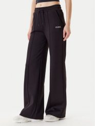 Guess Spodnie dresowe V5YB03 KCX22 Czarny Regular Fit. Czarne spodnie dresowe damskie Guess, z aplikacjami, z dresówki. Za 279.99 zł.