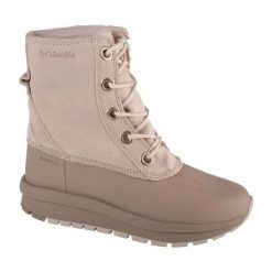 Buty Columbia Moritza Shield Omni-Heat 2100381102 beżowy. Brązowe śniegowce damskie ze skóry, za kostkę, bez zapięcia. Za 610.80 zł.