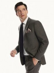 Marynarka slim fit z wełną - ciemnobrązowy. Brązowe garnitury męskie Reserved, l, bez wzorów, z tkaniny, bez kołnierzyka, bez ramiączek. Za 459.99 zł.