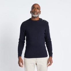 Sweter marynarski męski Tribord. Niebieskie swetry męskie TRIBORD, l, bez wzorów, z bawełny, sportowe, bez kołnierzyka, bez ramiączek. Za 119.99 zł.