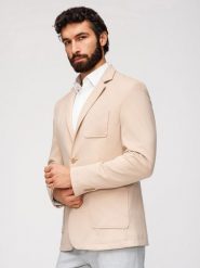 Męska slimowana marynarka SLIM z dzianiny o subtelnej strukturze – beżowa V5 - Rozmiar: XL. Brązowe marynarki męskie Ombre Clothing, l, bez wzorów, z bawełny, biznesowe, bez kołnierzyka, bez ramiączek. W wyprzedaży za 265.99 zł.