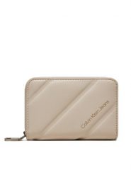 Calvin Klein Jeans Portfel Quileted Med Zip K60K612256 Écru. Białe portfele damskie Calvin Klein Jeans, z jeansu. Za 259.99 zł.