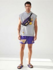 Saszetka NBA - czarny. Czarne saszetki i nerki męskie Sinsay, bez wzorów. Za 29.99 zł.