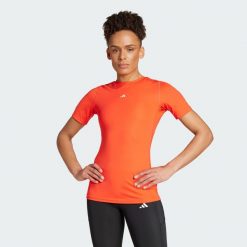 Koszulka Techfit Training. Czarne bluzki damskie Adidas, m, bez wzorów, z dzianiny, sportowe, bez kołnierzyka, bez ramiączek. Za 169.00 zł.