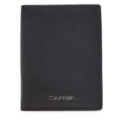 Portfel Calvin Klein. Czarne portfele męskie Calvin Klein, bez wzorów. Za 199.99 zł.