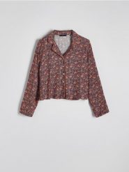 Góra od piżamy - czarny. Czarne piżamy damskie Reserved, bez wzorów, z tkaniny, bez ramiączek. W wyprzedaży za 65.99 zł.
