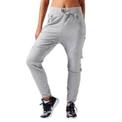 Spodnie sportowe damskie Reebok Dance Knit Moto. Szare spodnie dresowe damskie Reebok, bez wzorów, z dresówki, sportowe, długie. Za 332.00 zł.
