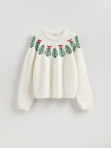 Sweter ze świątecznym wzorem - złamana biel. Swetry nierozpinane damskie Reserved, l, bez wzorów, z dzianiny, wizytowe, bez kołnierzyka, bez ramiączek. Za 159.99 zł.