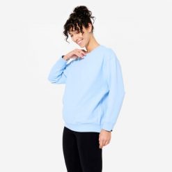 Bluza do jogi damska Kimjaly ciążowa. Niebieskie bluzy damskie DOMYOS, l, bez wzorów, z elastanu, sportowe, bez ramiączek, bez kaptura. Za 99.99 zł.