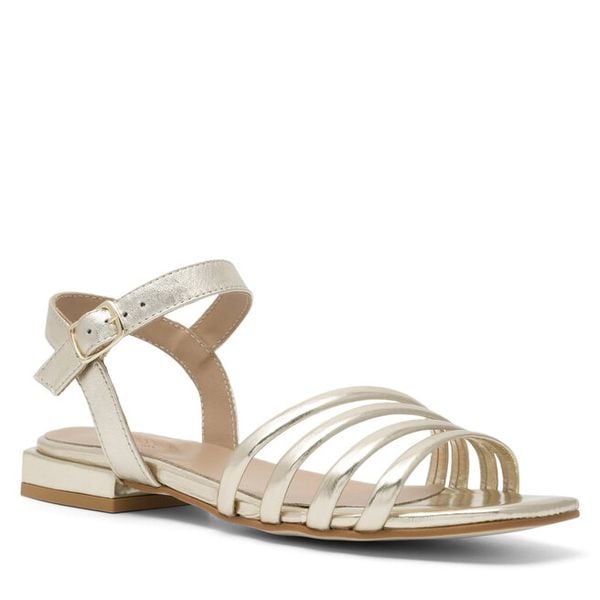 Sandały Badura. Żółte sandały damskie Badura, bez wzorów, bez obcasa, na płaskiej podeszwie, bez zapięcia. Za 269.99 zł.