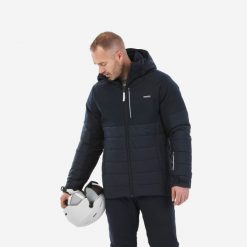 Kurtka narciarska męska Wedze 100 Warm. Niebieskie kurtki sportowe męskie WED'ZE, na zimę, m, bez wzorów, z materiału, bez kaptura, narciarskie. Za 369.99 zł.