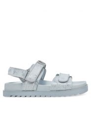 Guess Sandały FLJFDS LEL03 Niebieski. Niebieskie sandały damskie Guess, z aplikacjami, ze skóry, bez obcasa, na płaskiej podeszwie, bez zapięcia. Za 499.99 zł.