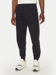 Armani Exchange Spodnie dresowe XM000472 AF13109 UB101 Granatowy Regular Fit. Niebieskie spodnie sportowe męskie Armani Exchange, l, bez wzorów, z bawełny. Za 349.99 zł.